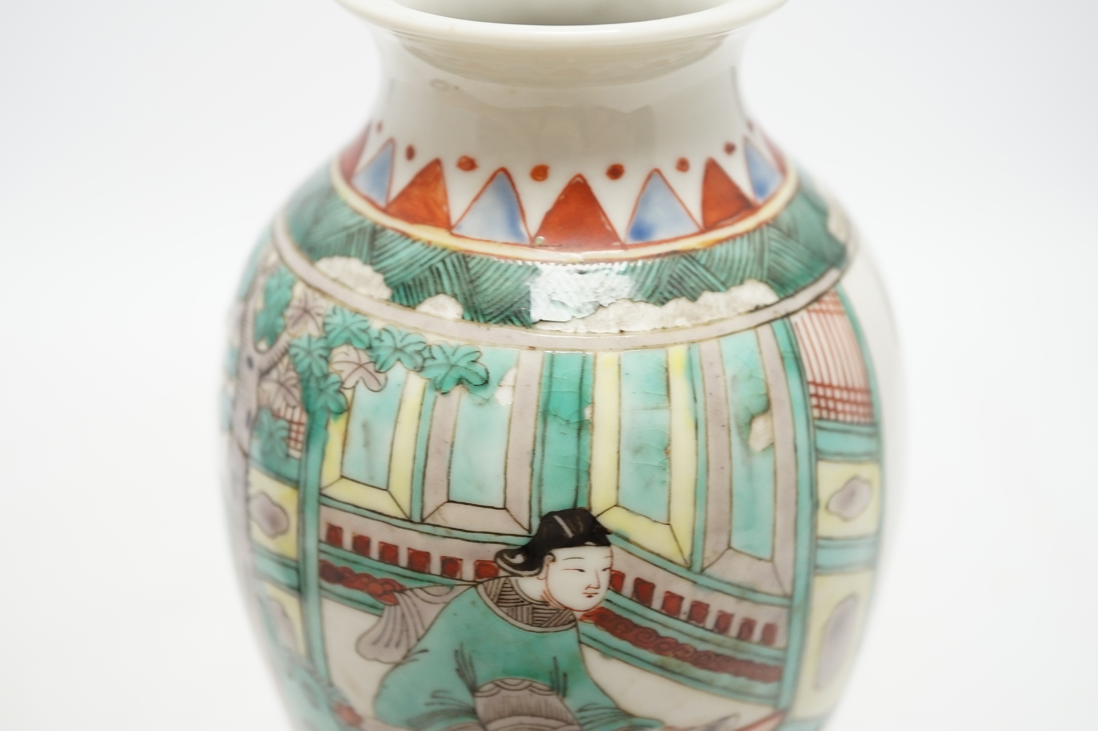 A 19th century Chinese porcelain famille verte vase and associated hardwood stand, 23cm high. Condition - good